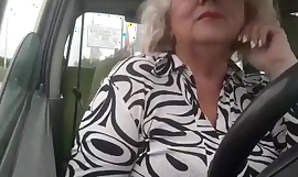 Naughty granny with big natural Bristols masturbates here the car