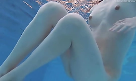 Striped swimsuit and small gut teen Anna Netrebko