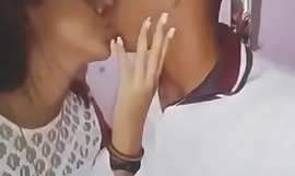 Indian boy giving a kiss his steady old-fashioned
