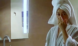 Despondent asian indulge receives sensual massage by fireplace