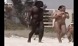 Black man on a nudist beach