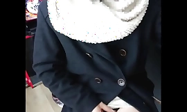 A daring cross-dresser flauntingly exposes ourselves in a bustling joke center, amid slot machine thrills and outdoor excitement.